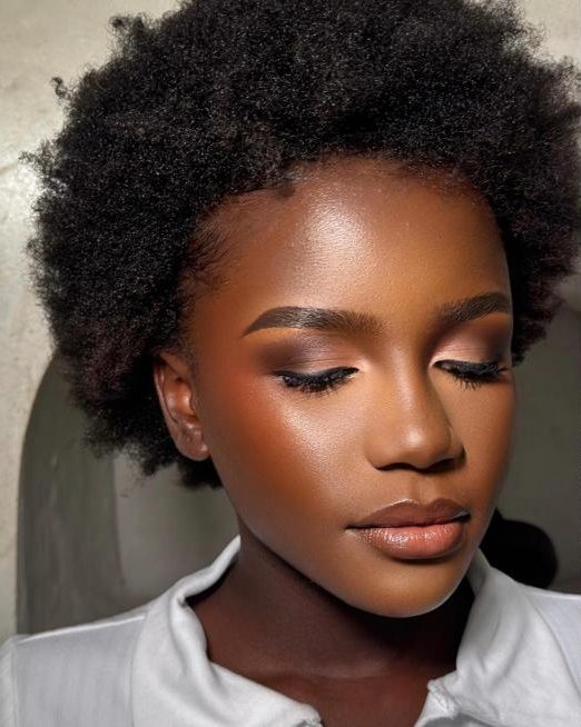 Bronze glam makeup on natural afro hair